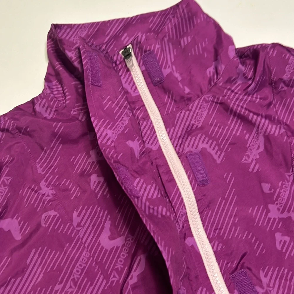 Vintage Reebok purple 90s 80s windbreaker. Unisex. Excellent condition. Size M